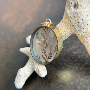dendritic quartz pendant in gold setting