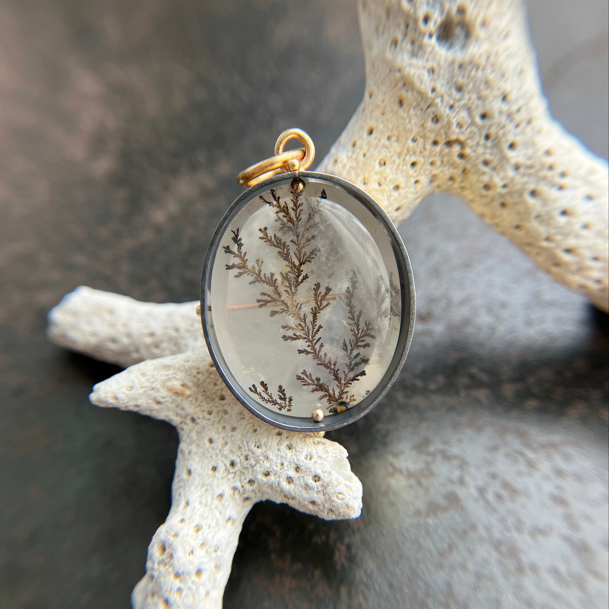 dendritic quartz pendant in gold setting