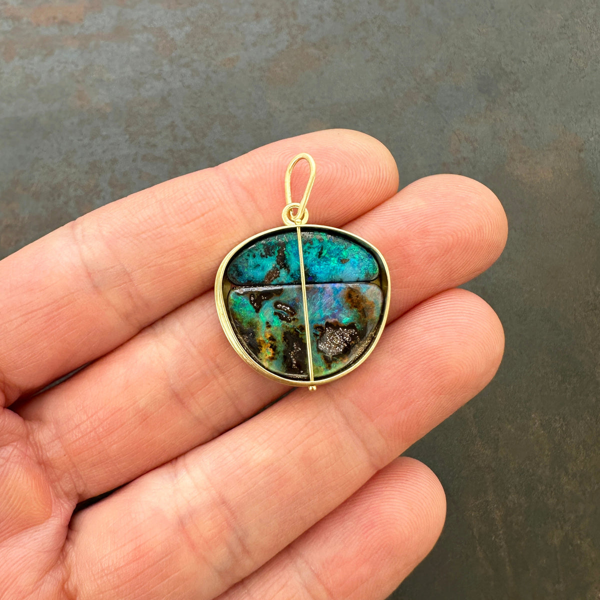gold pendant with two boulder opals