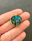 gold pendant with two boulder opals