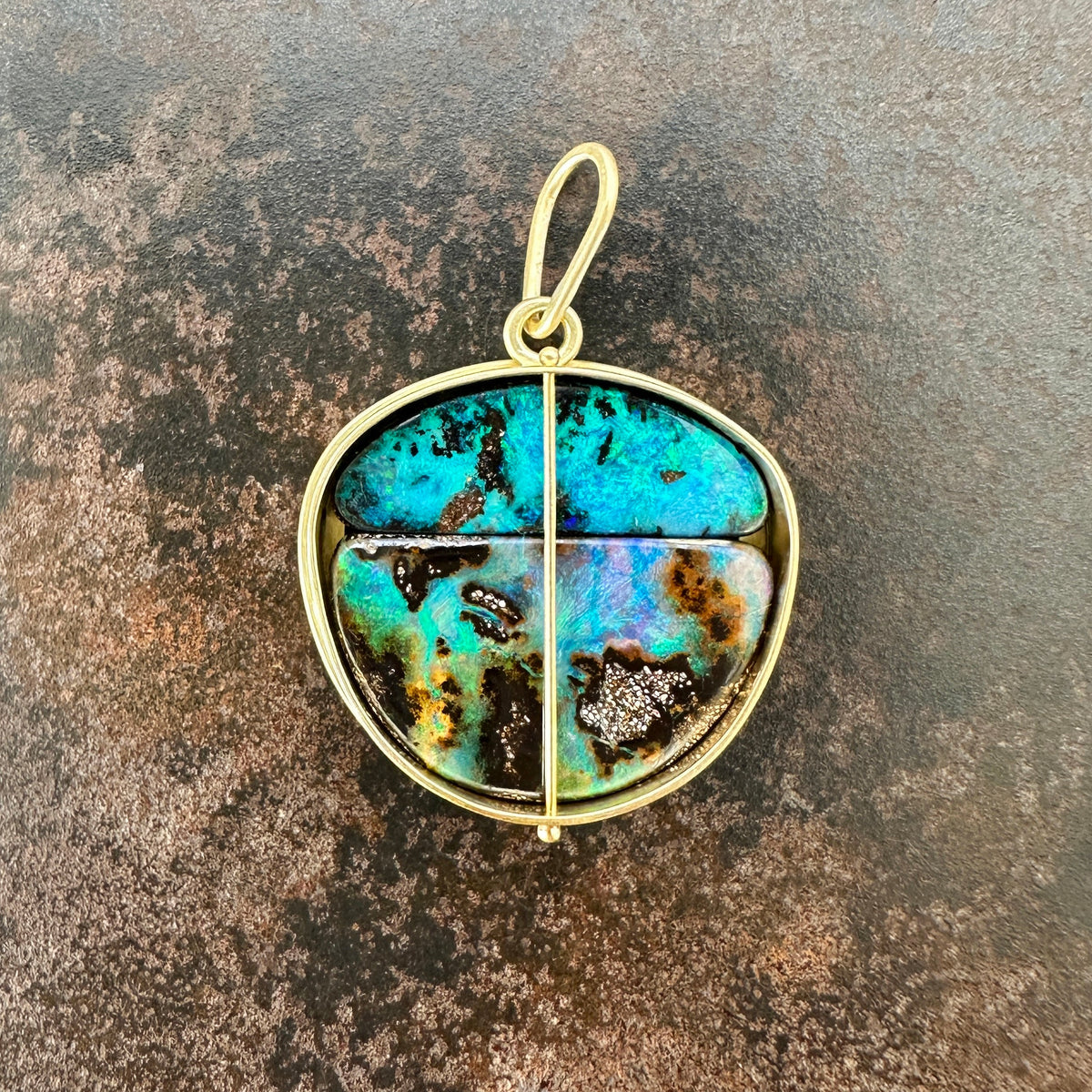 gold pendant with two boulder opals