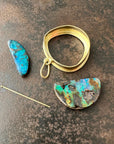 gold pendant with two boulder opals
