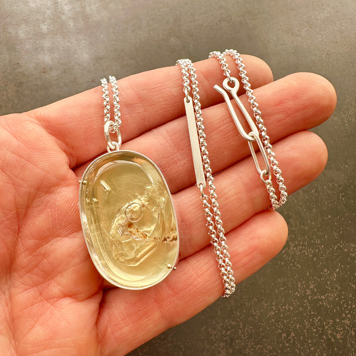 enhydro quartz 18k bimetal necklace with 3 way silver rolo chain