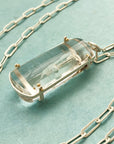 enhydro quartz pendant in silver and 18k gold