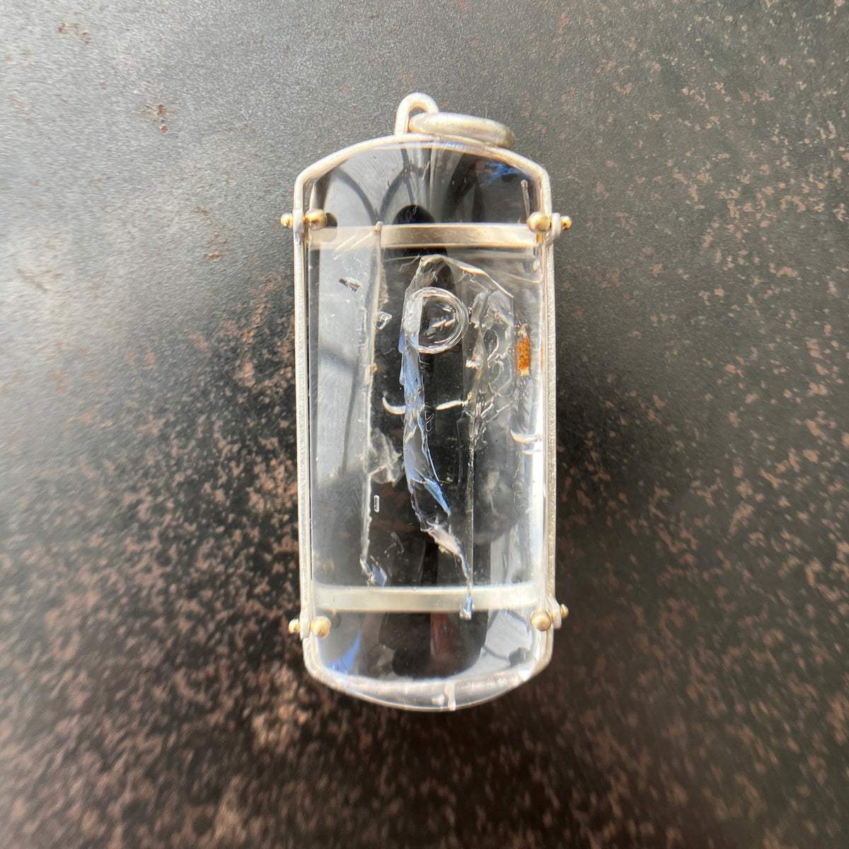 enhydro quartz pendant in silver and 18k gold