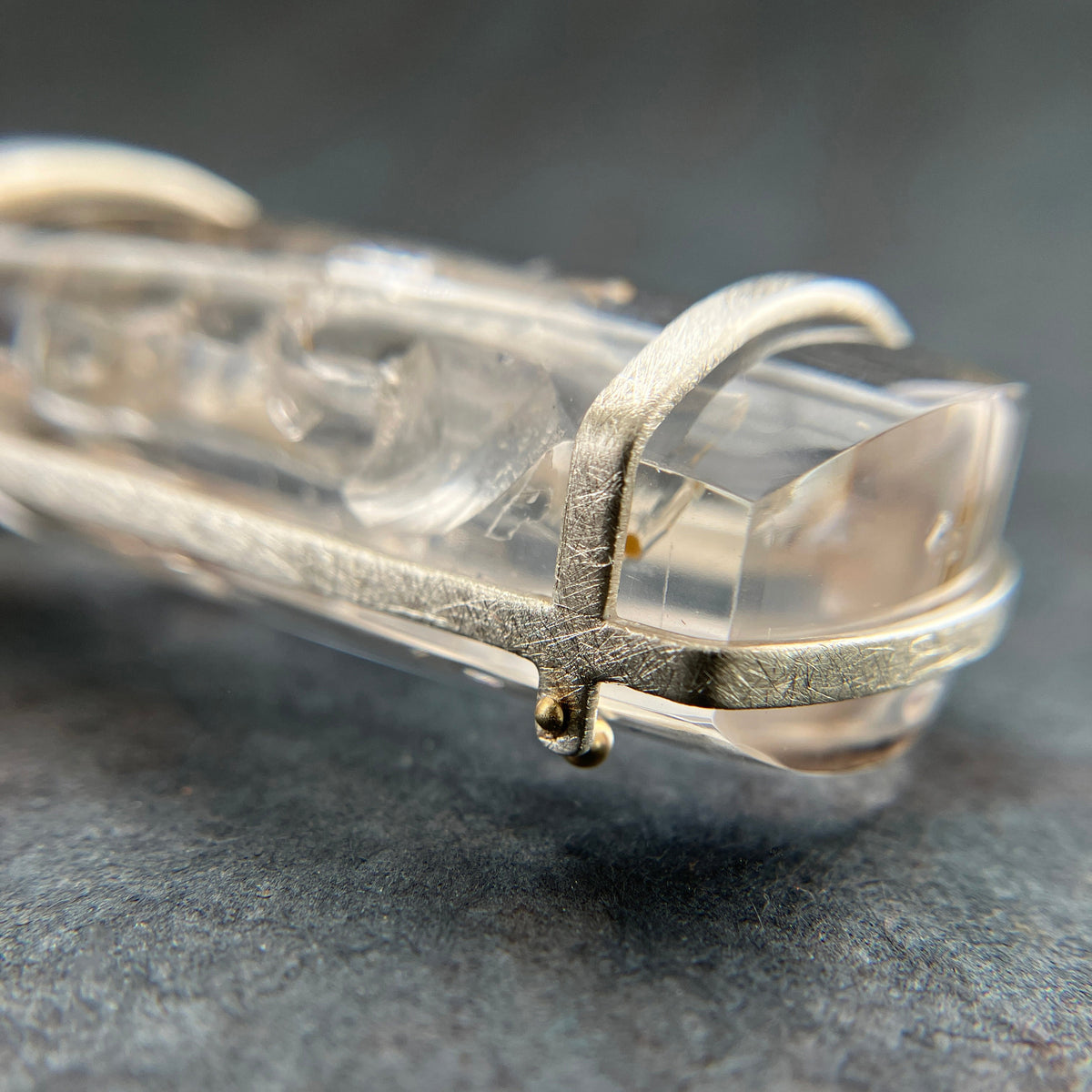enhydro quartz pendant in silver and 18k gold