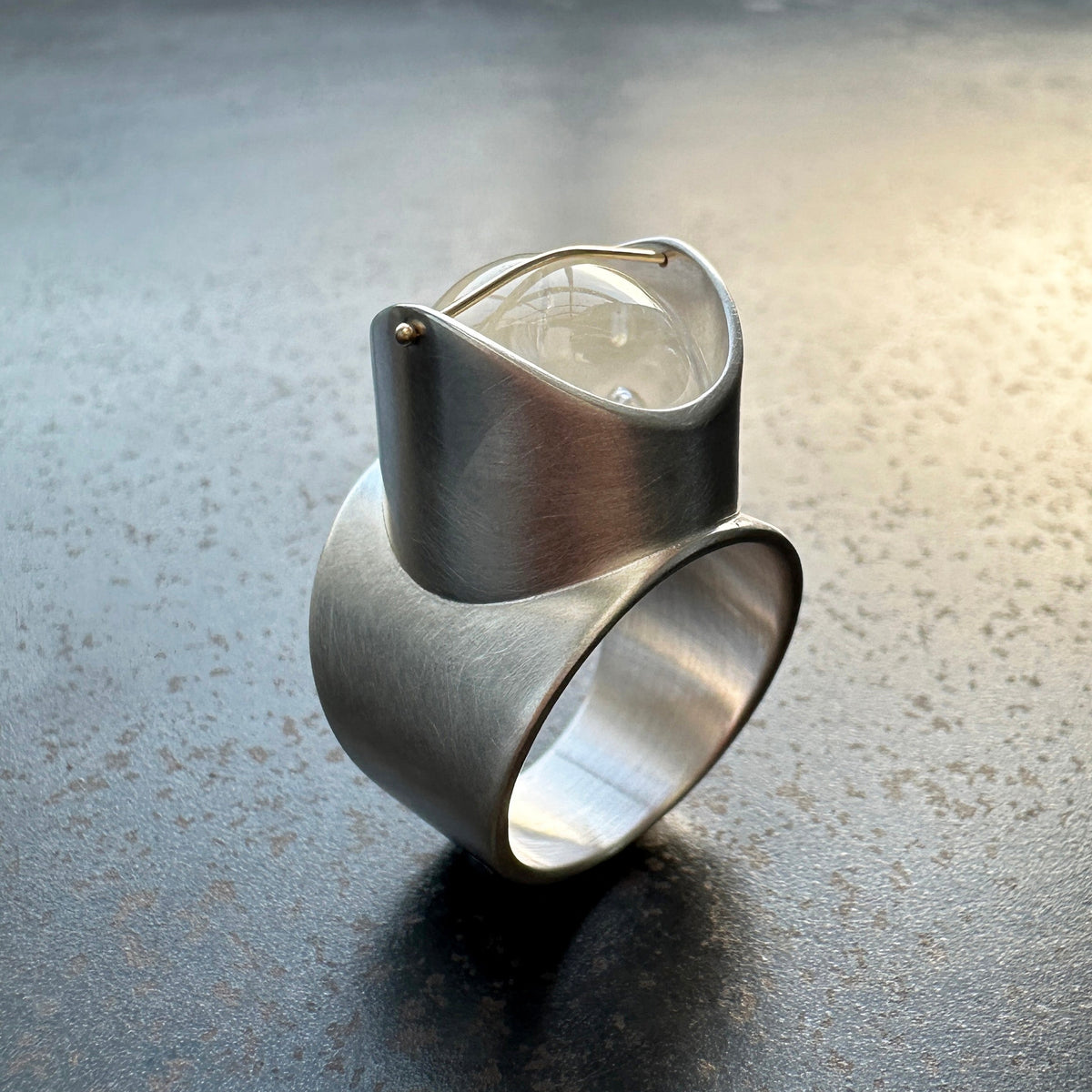 Silver ring with enhydro quartz stone
