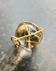 golden rutilated quartz orb pendant captured in 18k gold