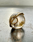 golden rutilated quartz orb pendant captured in 18k gold