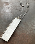 mother of pearl carved pendant with silver 3 way paperclip chain