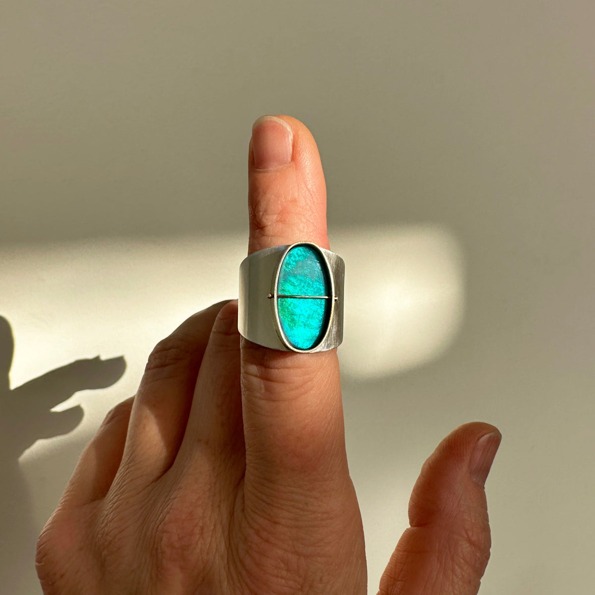 Captured Oval Opal Ring