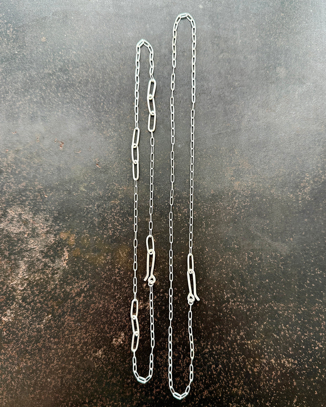 mother of pearl carved pendant with silver 3 way paperclip chain