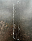 mother of pearl carved pendant with silver 3 way paperclip chain