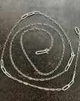 mother of pearl carved pendant with silver 3 way paperclip chain