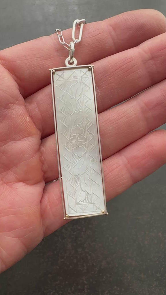 mother of pearl carved pendant with silver 3 way paperclip chain