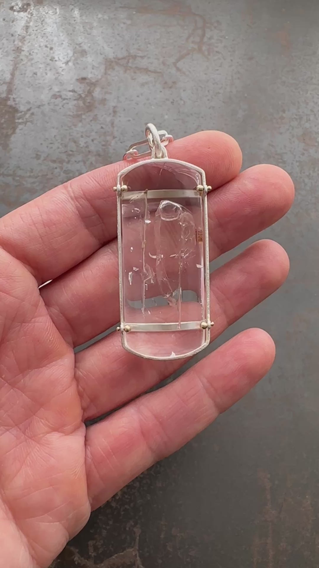 enhydro quartz pendant in silver and 18k gold