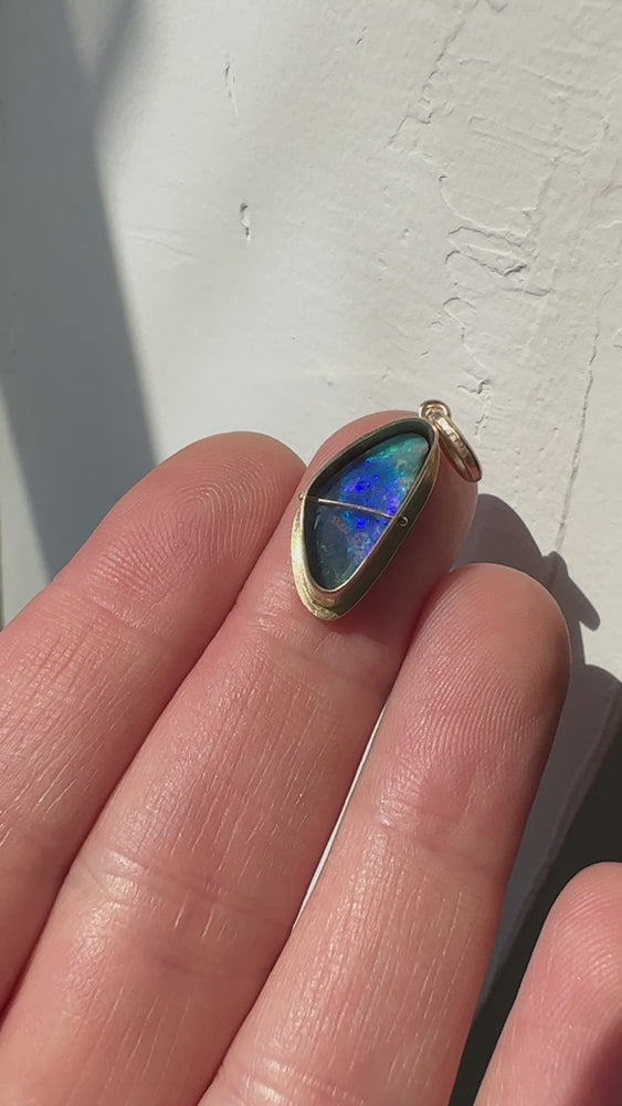 
                
                    Load and play video in Gallery viewer, Captured Australian Boulder Opal Charm
                
            