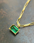 green radiant cut tourmaline pendant in 18k gold