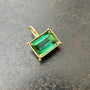 green radiant cut tourmaline pendant in 18k gold