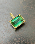 green radiant cut tourmaline pendant in 18k gold
