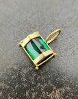 green radiant cut tourmaline pendant in 18k gold
