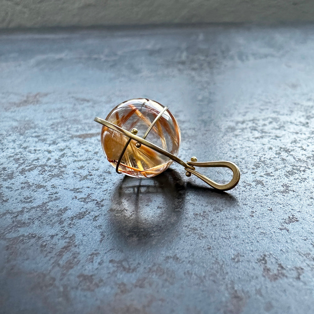 Captured Rutilated Quartz Orb Charm