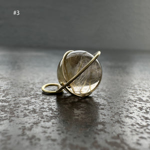 
                
                    Load image into Gallery viewer, Captured Rutilated Quartz Orb Charm
                
            