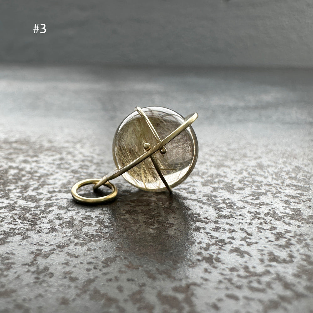Captured Rutilated Quartz Orb Charm