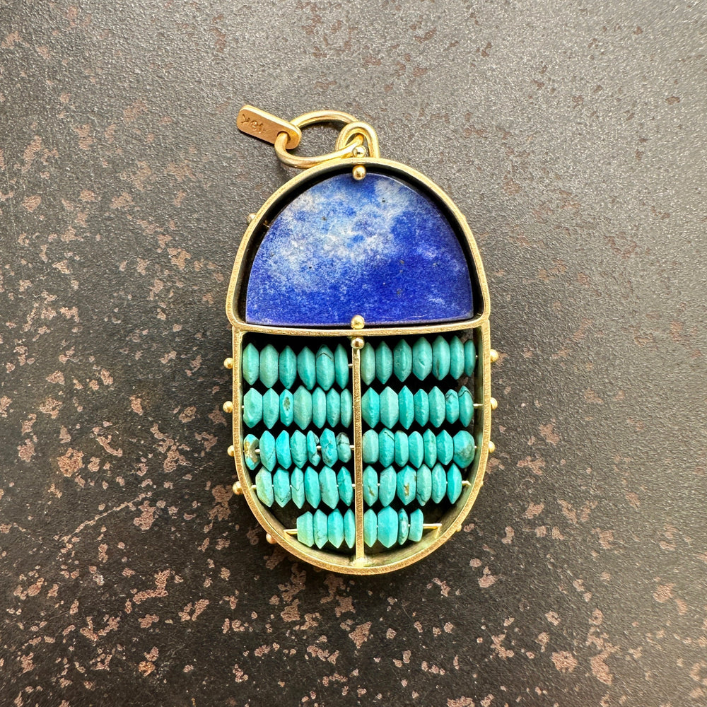 scarab shaped pendants of 18k gold, lapis, and turquoise beads