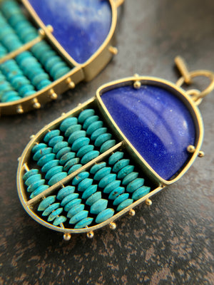 scarab shaped pendants of 18k gold, lapis, and turquoise beads