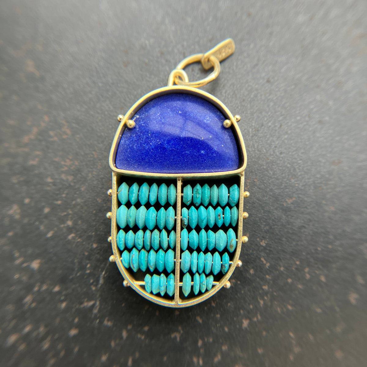 scarab shaped pendants of 18k gold, lapis, and turquoise beads