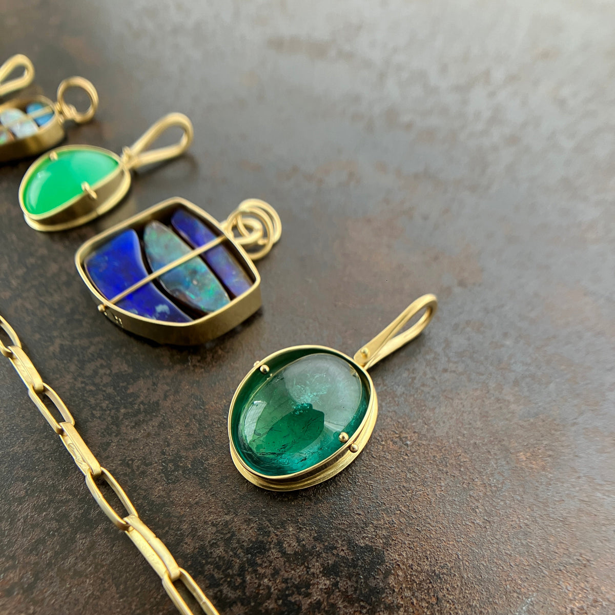 teal green tourmaline oval pendant in 18k gold