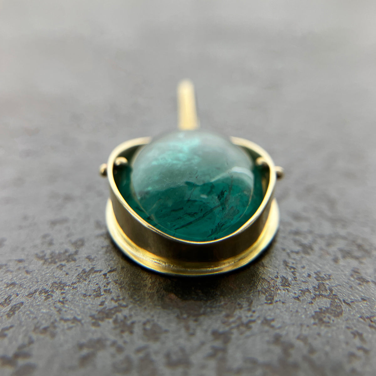 teal green tourmaline oval pendant in 18k gold