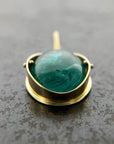 teal green tourmaline oval pendant in 18k gold