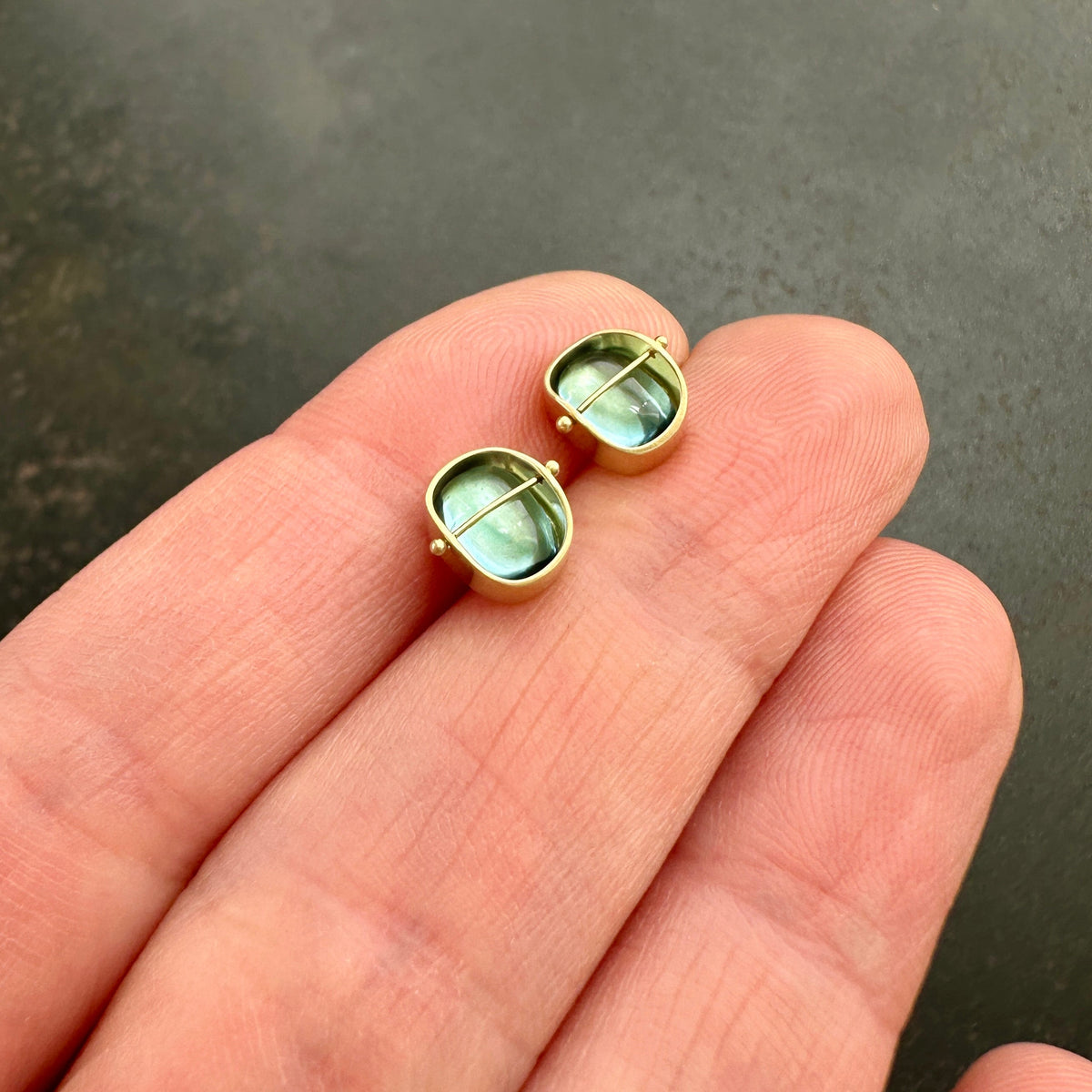 blue topaz stud earrings in 18k gold setting