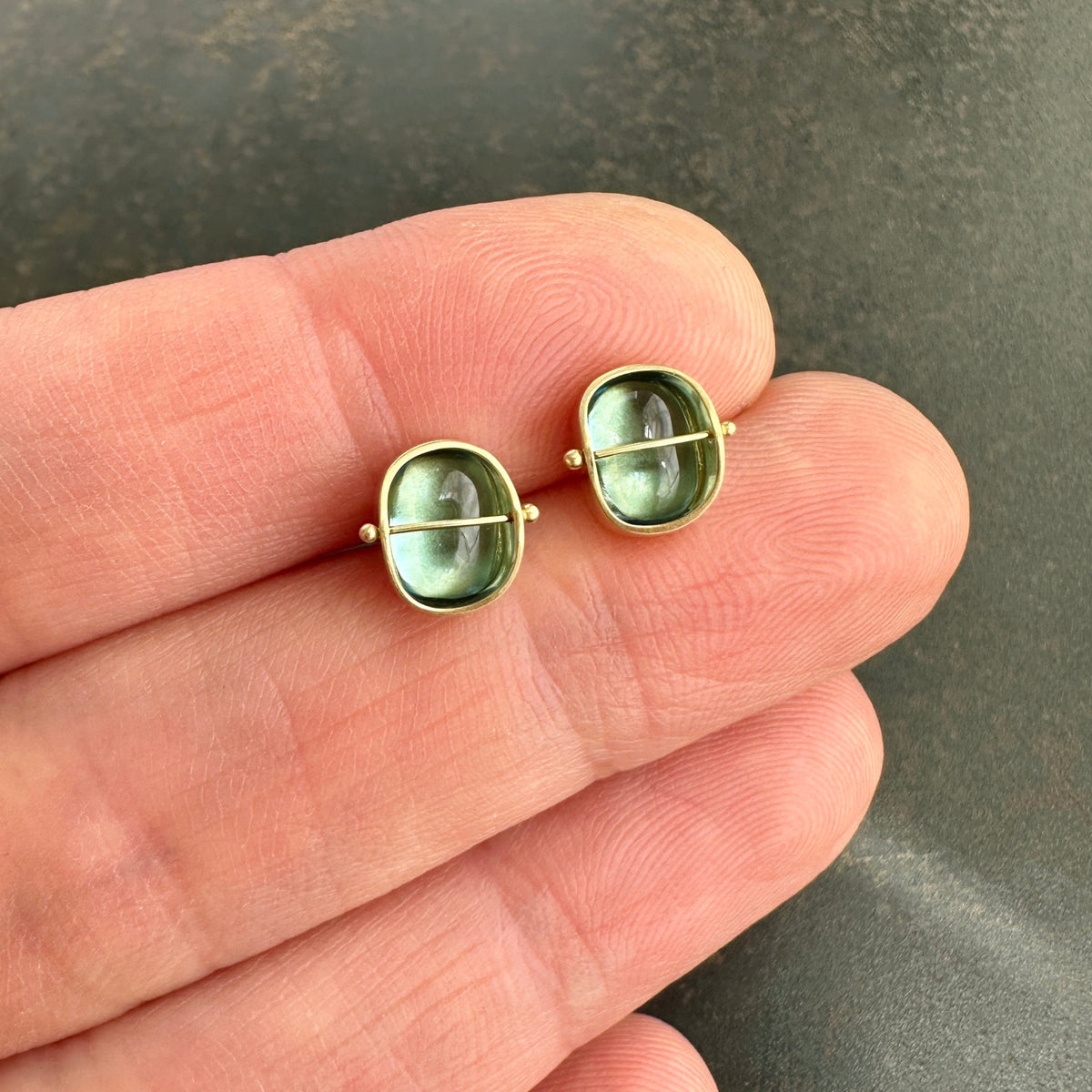 blue topaz stud earrings in 18k gold setting