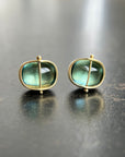 blue topaz stud earrings in 18k gold setting