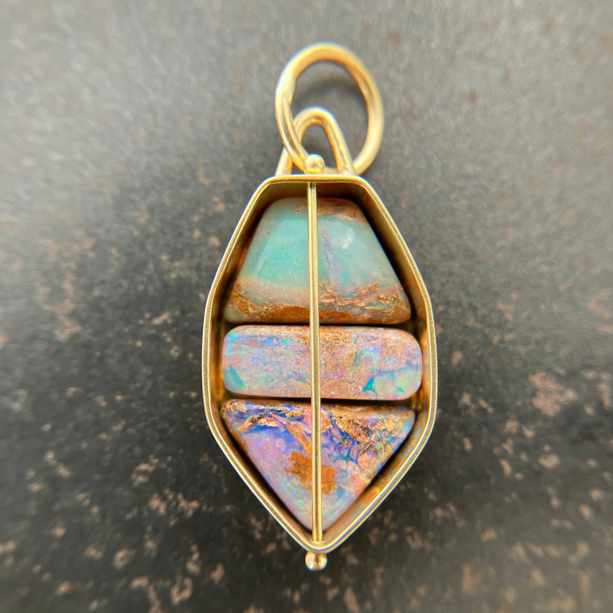 three wood opal pendnt in 18k gold