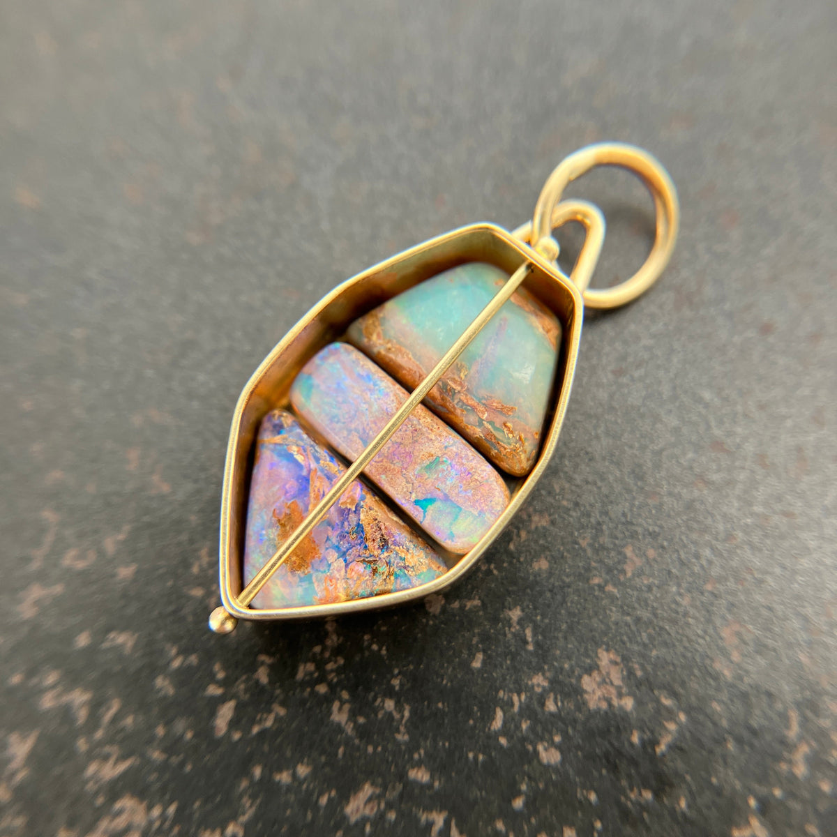 three wood opal pendnt in 18k gold