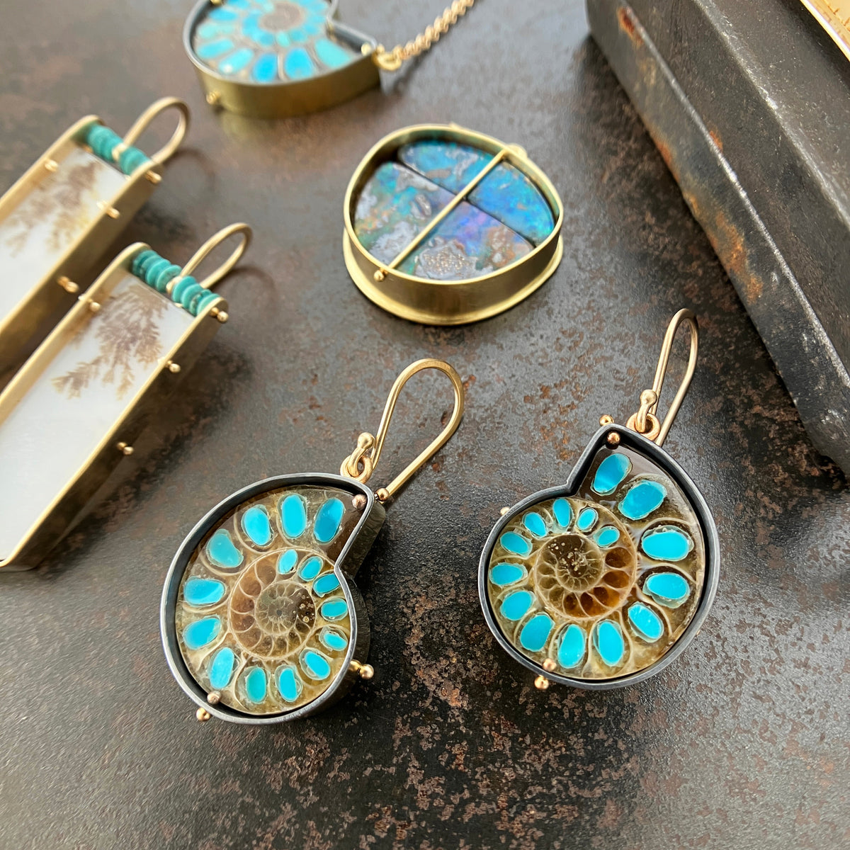 ammonite with embedded turquoise earrings in silver and gold on gold hooks