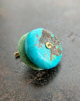 chinese hand carved turquoise beads with an 18k gold bale.