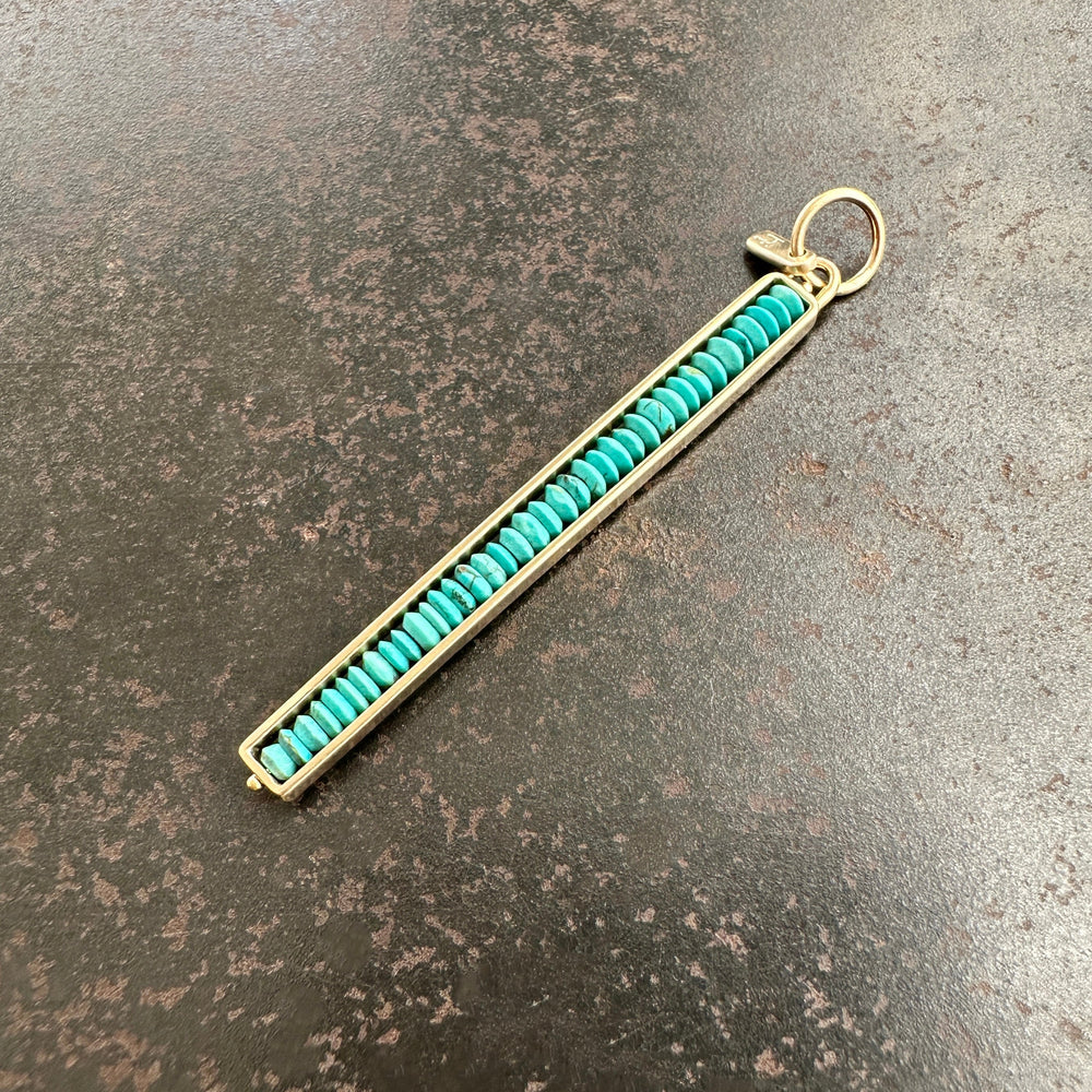 persian turquoise beads strung in a 14k gold frame, turquoise pendant, gold pendant