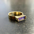 purple wood opal set in an 8k gold ring