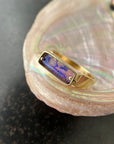 purple wood opal set in an 8k gold ring