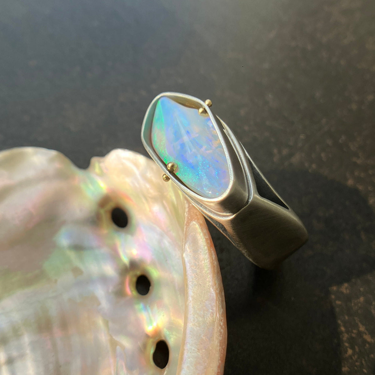 blue wood opal and silver architectural ring