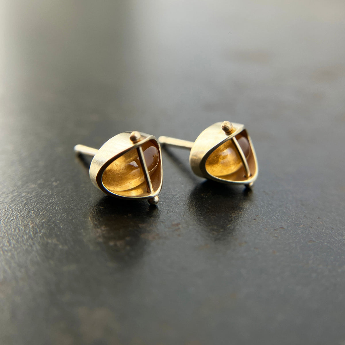 Pair of hessonite garnet stud earrings in 14k gold earrings