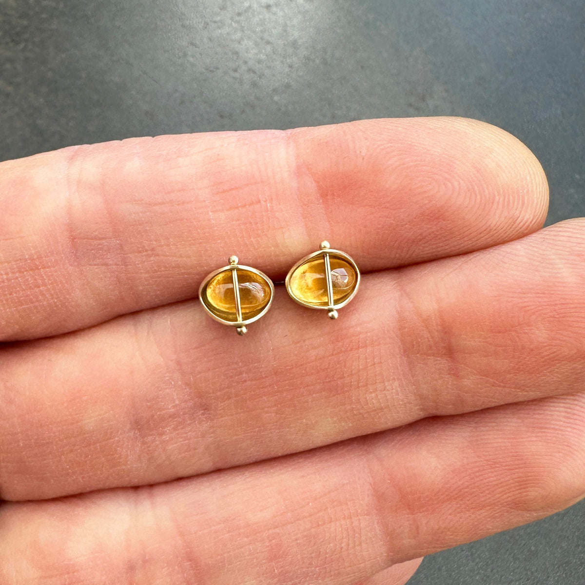 Pair of hessonite garnet stud earrings in 14k gold earrings