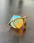 yellow green Ethiopian opal orb pendant set in 18k gold  