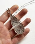 Captured Black Tourmaline in Quartz Teardrop Pendant on Long Chain