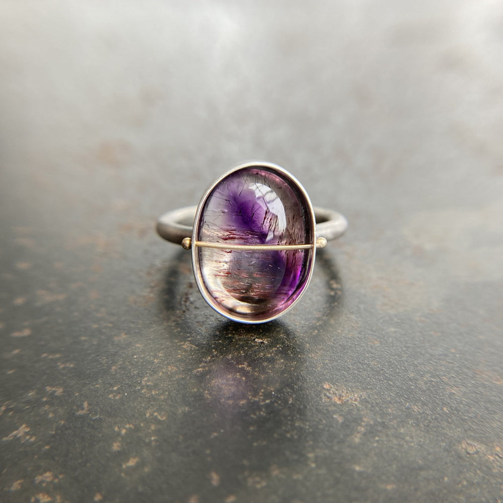 
                
                    Load image into Gallery viewer, Captured Hematite and Amethyst in Quartz Ring
                
            